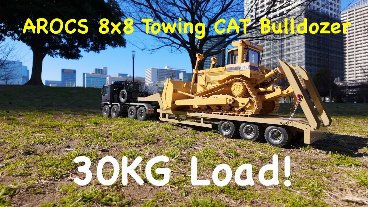 1/14 scale AROCS 8X8 Taking the CAT D10T to a Job Site