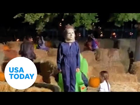Kid dressed as Michael Myers doesn't break character after fall | USA TODAY