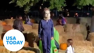 Kid dressed as Michael Myers doesn't break character after fall | USA TODAY