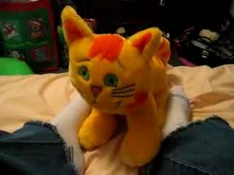 stuffed toy cat that meows