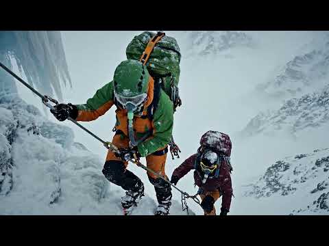 Woman climber ascending