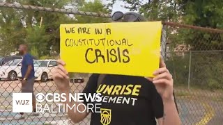 Baltimore community walk highlighting crime reduction comes amid Trump's threat to send in National