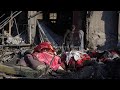 Israeli strikes hit two buildings in central Gaza, hospital officials and residents say
