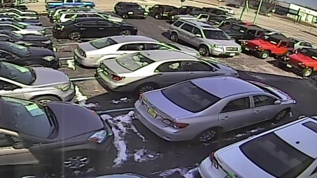 Video shows woman shooting at man at car dealership YouTube