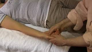 Asian massage on table hands and arms 4
