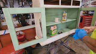 We bought an antique kitchen cabinet Hoosier I don t like it painted I want a stained wood look