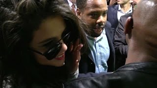 CRAZY  SELENA GOMEZ gets TRAPPED and CRUSHED by FANS in Paris