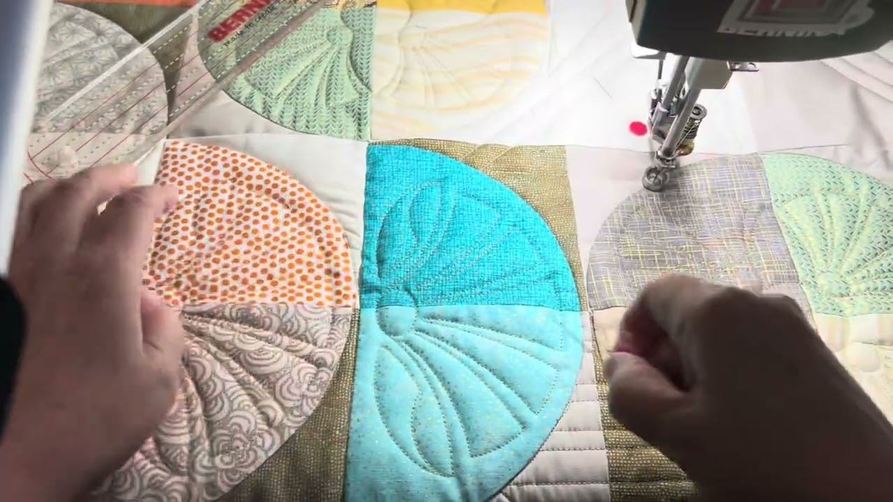 A modern quilting scheme comprises straight lines and digital