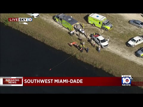 Helicopter crashes into canal in Miami-Dade