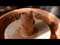 Изготовление котика на гончарном круге. The production of cat on a pottery wheel.