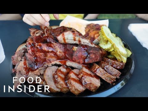 Kansas City Food Truck Serves Ribs In A Grocery Store Parking Lot