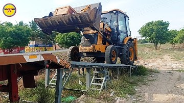 JCB 3DX 6 in one Bucket attachment machine loding in Leyland truck