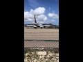 Airplane takeoff at Maho Beach (Sunset Beach) St. Maarten US Virgin Islands (Boeing 757)