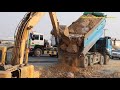 Dump Truck Unloading Rock Not Out Assisted by Excavator ឡានប៊ែនចាក់ថ្មមិនចេញ