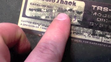 Unboxing a TRS-80 Model II Disk Drive unit.