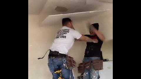 Guy has an extreme reaction to being tickled.