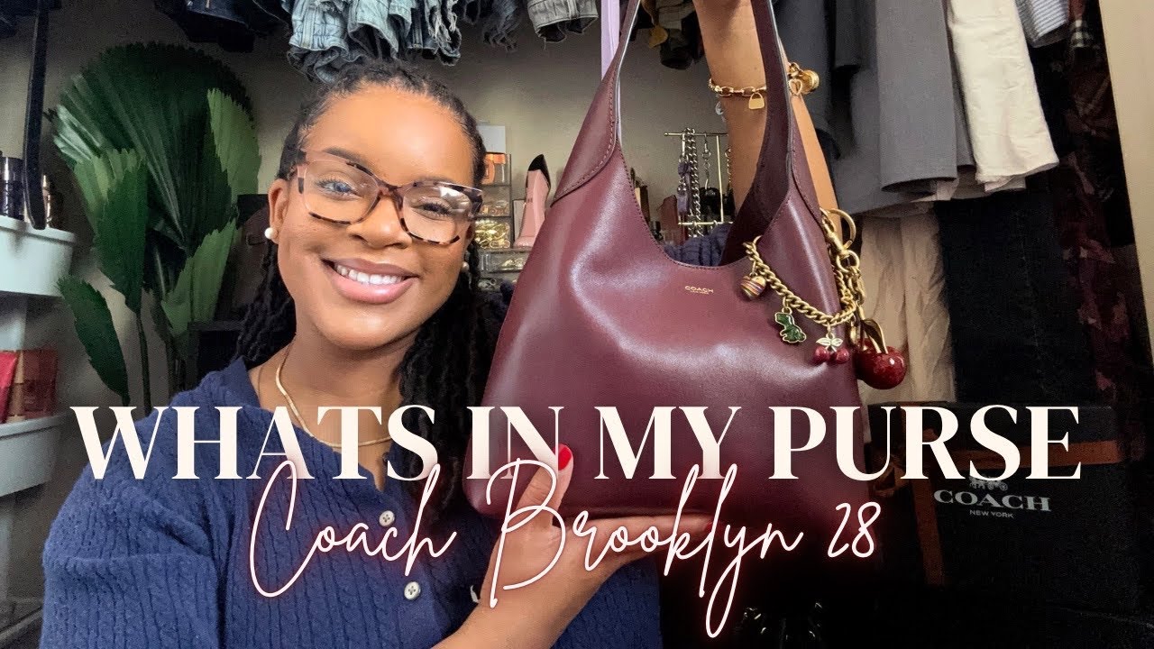 WHATS IN MY PURSE! Coach Brooklyn 28 Merlot with Coach Cherry Charm and Coach Motif Charm Chain 🍒🦖✨