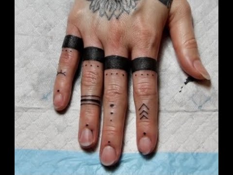 Blackwork tattoos on fingers  Tattoogridnet