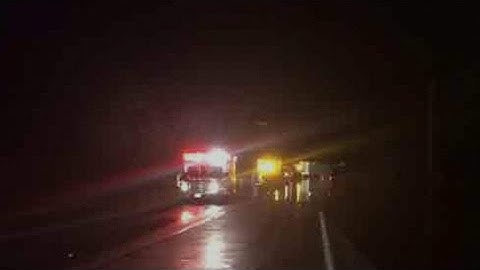 Students rescued from school bus swept away by floodwaters