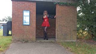 Crossdresser Posing at the Bus Stop