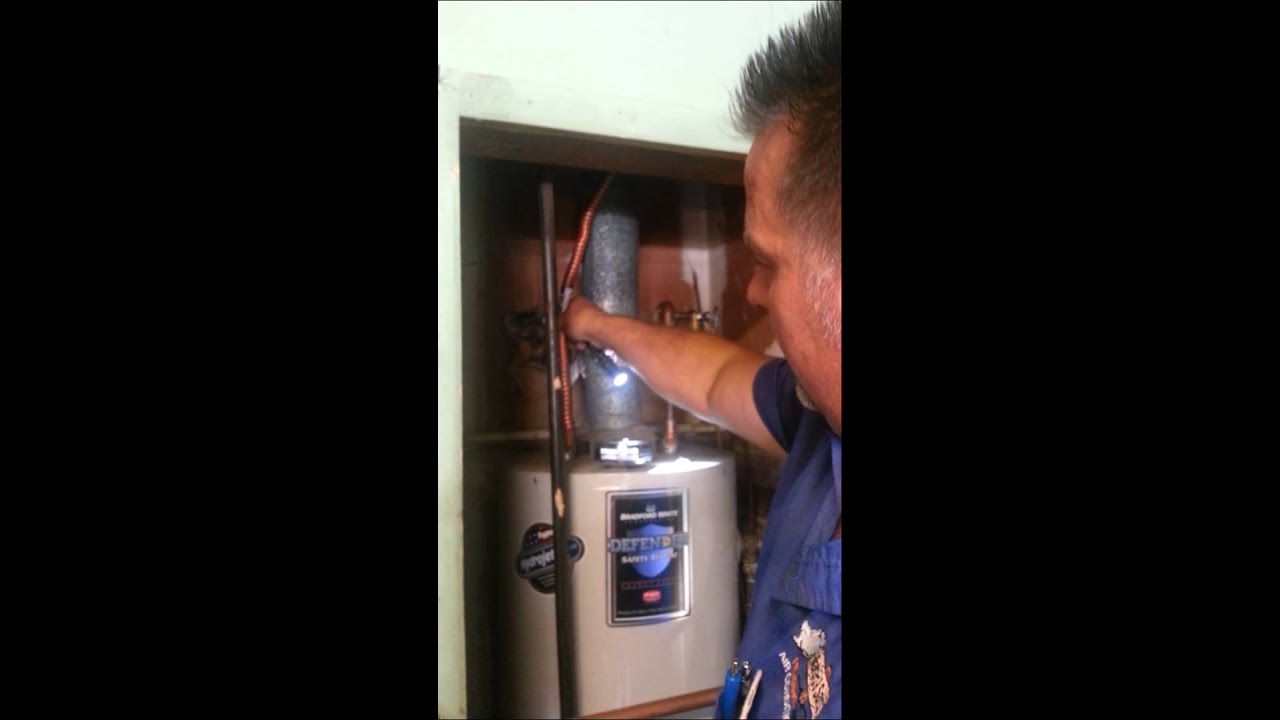 How to raise hot water tank to meet codes 