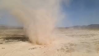 Drone perspective on a dust devil in the Nevada desert.