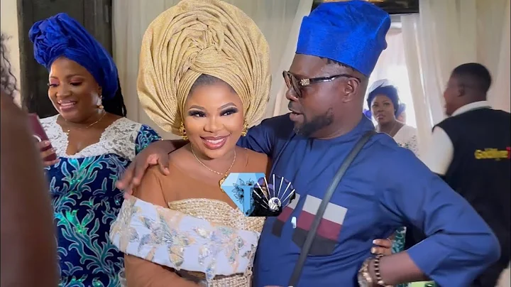 MOMENTS KUNLE AFOD LEADS SEYI EDUN TO THE STAGE AT THE JOHNSONS NAMING DEDICATION