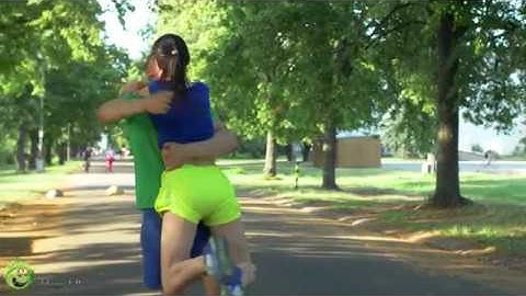 Athletic male runner crossing the finish line