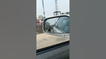 Two reckless bikers are trying to overtake a private car from the left side while turning. #shorts