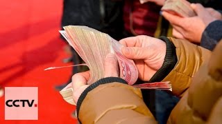 2015 Chinese average yearly income: 53,615 yuan