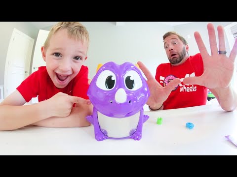 Father & Son PLAY DRAGON SNACKS GAME! / It's In His Mouth!