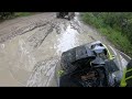 Outlander 570 xmr out having fun, in the mud and rain. Can am maverick brakes a second Deman axle.