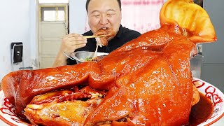 My fatherinlaw sent me a pig head. A Qiang made a spicy marinated pig head with 1kg of cold noodl