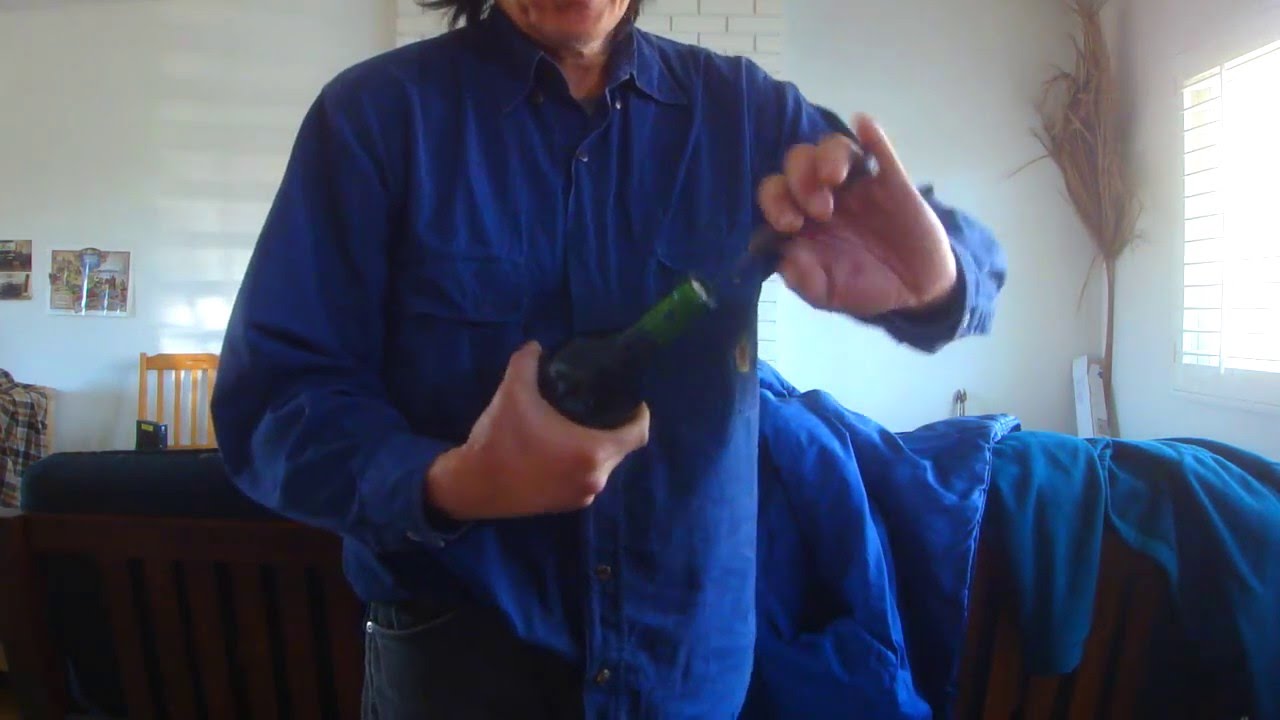 Open a wine bottle with a small knife