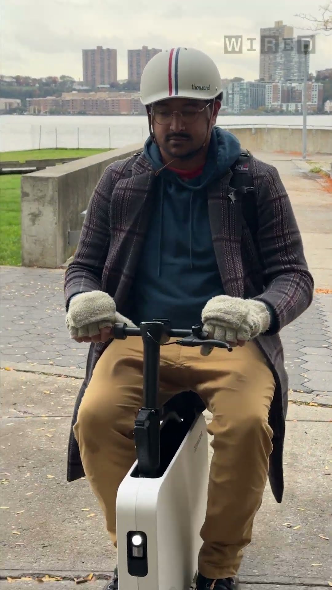 An Electric Scooter That Folds Like a Suitcase