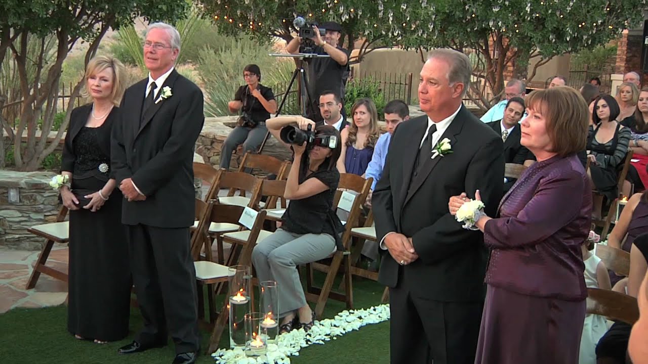 Couple Steps Aside At Wedding for Their Parents' Surprise Vow Renewal