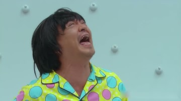 A man trapped in an empty room with random buttons on the walls