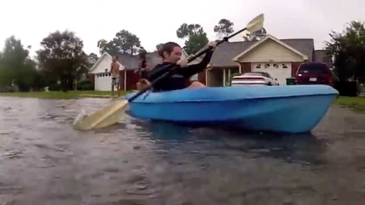 Kayaking through the streets during Floridian flood - YouTube
