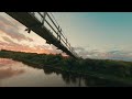 Подвесной мост в Верхней Тойме / Sunset over river and the bridge. FPV flight