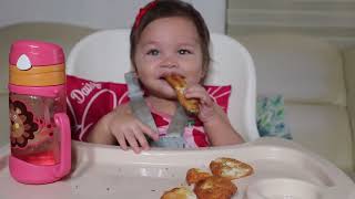 1 year old baby eating chicken & potato nuggets