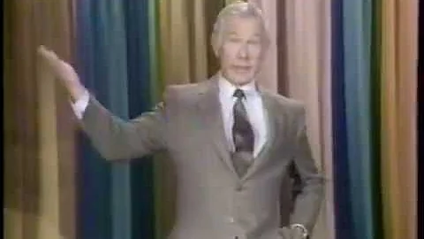 Johnny Carson with some help from Tommy Newsom , R...
