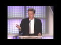 Paul mccartney inducts james taylor at the 2000 rock  roll hall of fame induction ceremony