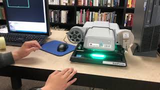 How to use a microfilm machine