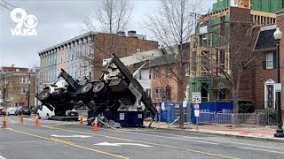 Construction crane slams through roof of house in NW DC, crews rescue injured worker