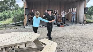 Anne S. learns some swing dance steps at Vala's Pumpkin patch 9-20-25