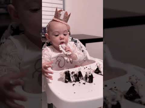 Scarlett turns one and enjoys her first bite of chocolate cake🎂