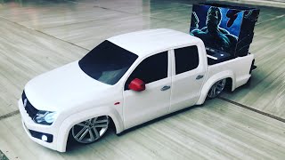 RACHA DE SOM ENTRE MINI AMAROK E CARRETINHA TSUNAMI 