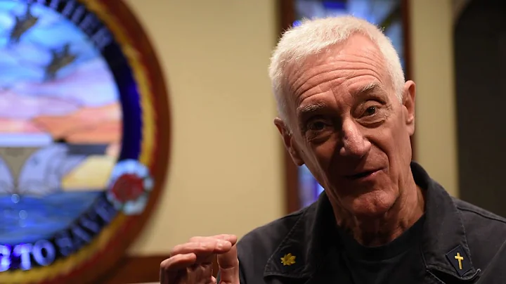 Father William D. Dorwart, CHC, LCDR, USN, relects...