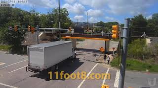 Boxtruck tries to sneak up to the 11foot8+8 bridge