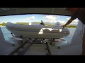 The innovative tender  dinghy storage garage found on the jeanneau 64 sailing yacht by ian vantuyl